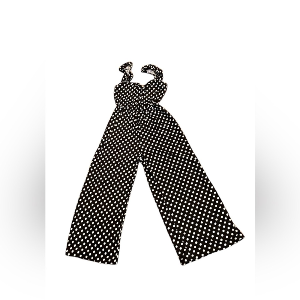 Cute polkadot jumpsuit. Brand new. Never been worn.
